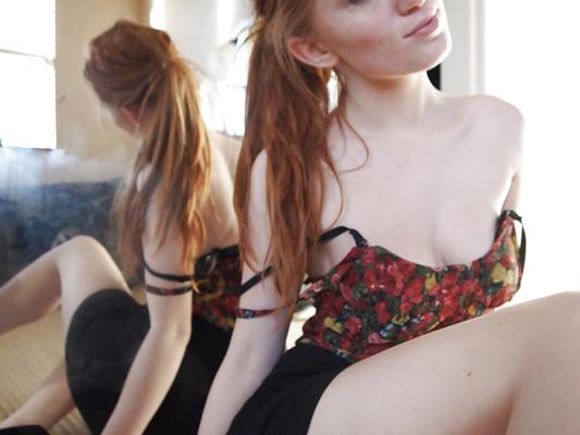 25P A charming 18-year-old red-haired girl