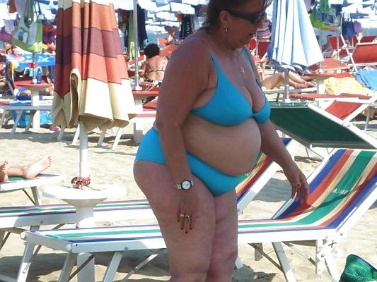 25P Busty granny on the beach! Mixed!