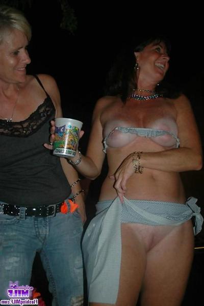 21P Amateur matures outside with their tits hanging out 1  