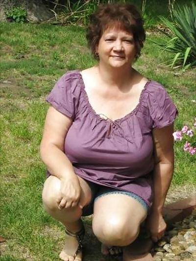 20P Not naked busty mature women 6.