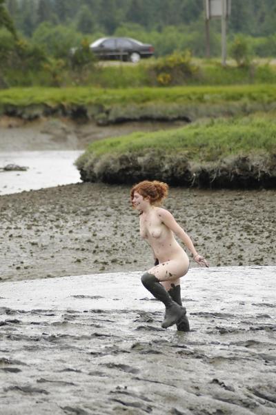 12P Playing in the mud.