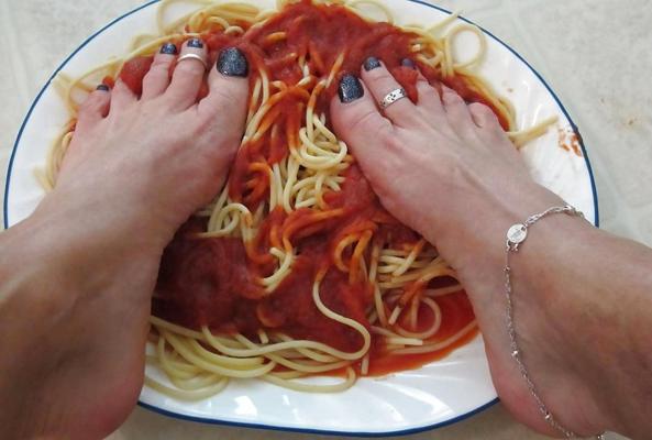 25P Girls feet covered in food