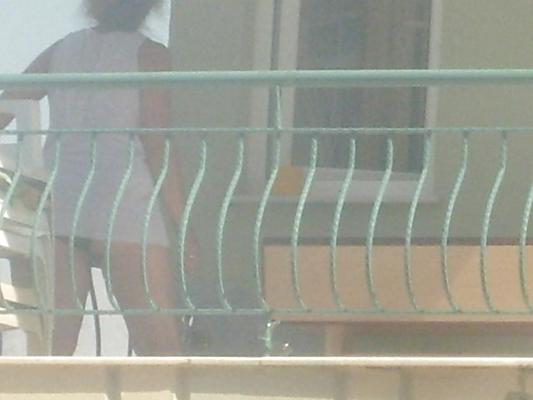 5P Voyeur upskirt at balcony