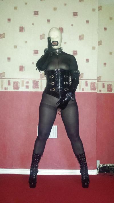 8P Slave girl in white rubber hood and ankle boots
