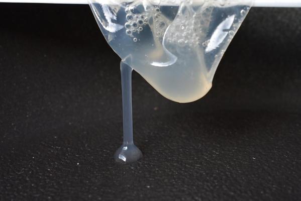 17P Precum and Cum dripping out of condoms (closeup)
