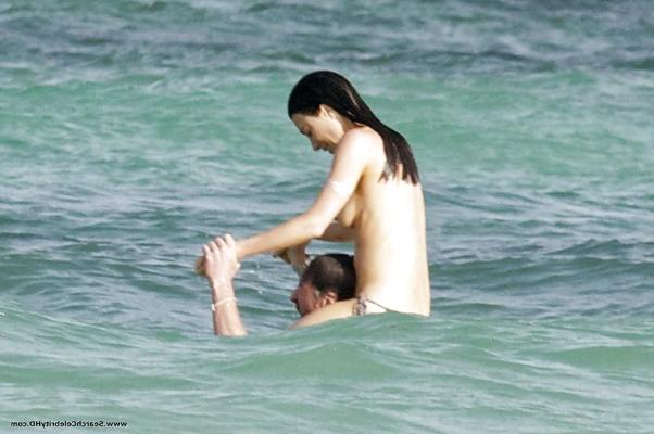 25P Jaime Murray Topless On The Beach in Mexico