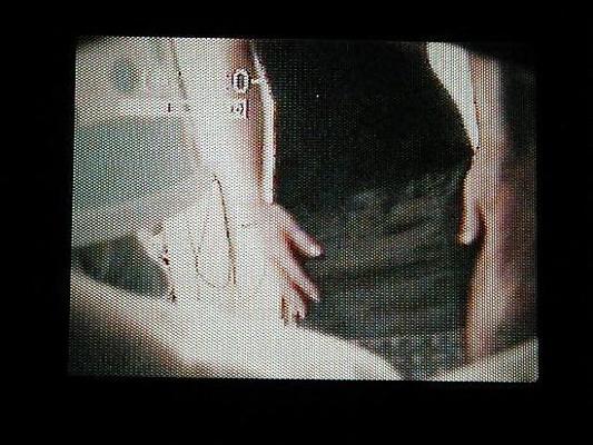 25P 着替え中の妻の隠しカメラビデオからの写真
