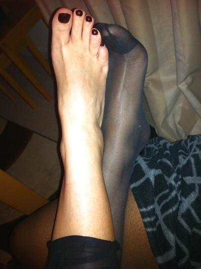 15P Her sexy feet in and out of her hold ups