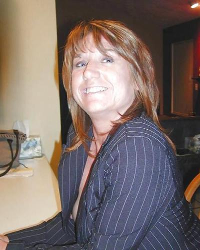 20P Businesswoman stripping after work