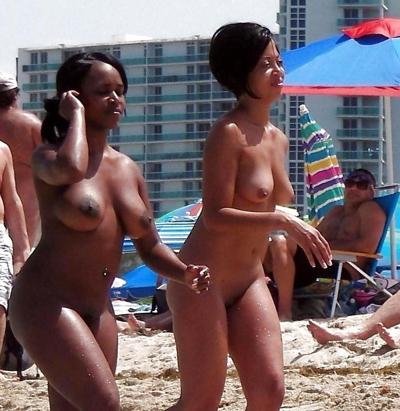 18P Ebony women on the beach