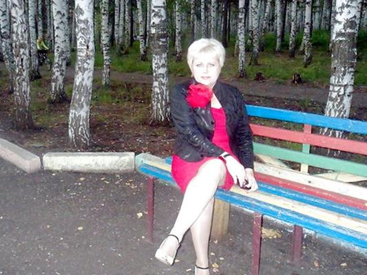 13P Russian mature woman with sexy legs!