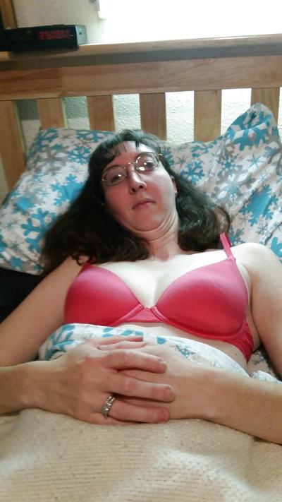 4P My wife in glasses and red bra. she's hot.