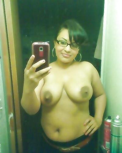 10P A Nerdy Latina Showing Some Titty Wearing Glasses 