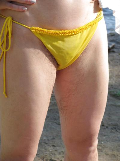 14P Hairy woman on the beach