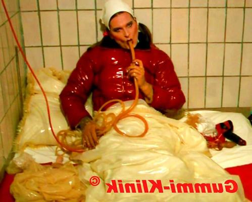 15P Kinky tranny in rubber clinic