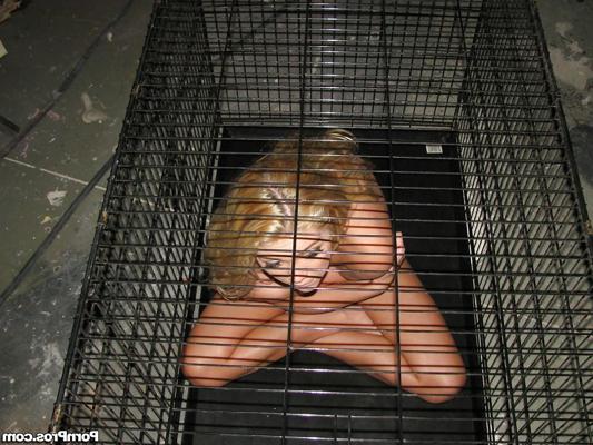 15P Amateur babe Jessie Andrews is imprisoned in her socks, in a cage