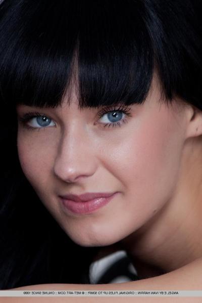 18P Dark haired beauty Angel E displaying tiny boobs while posing in the nude