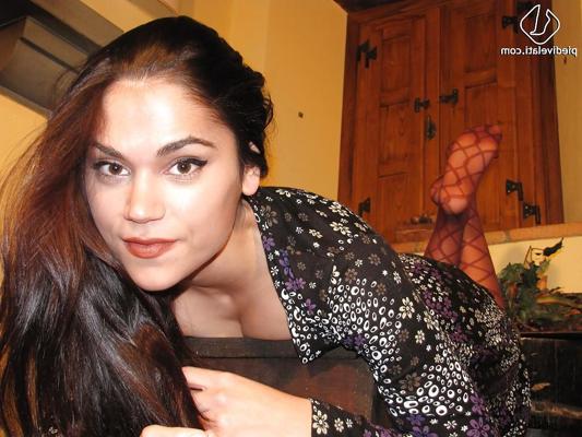 16P Smashing beauty Chiara is showing her sexy long legs in pantyhose