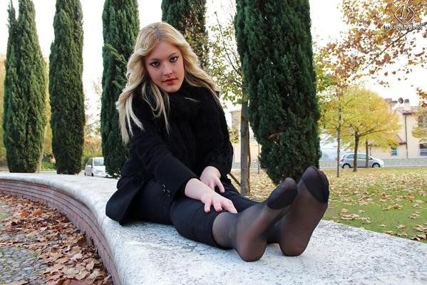 16P Smooth looking blonde babe Christelle in foot fetish mood outdoor