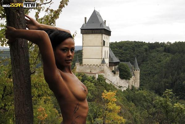 16P Well-toned tanned teen performs a nice striptease in a public place