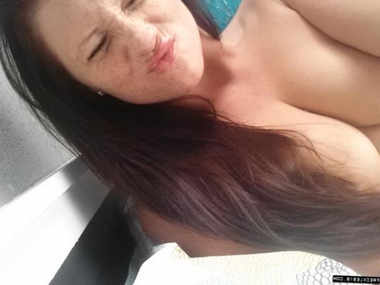 12P Self shot of brunette amateur Freckles showing cameltoe in sheer panties