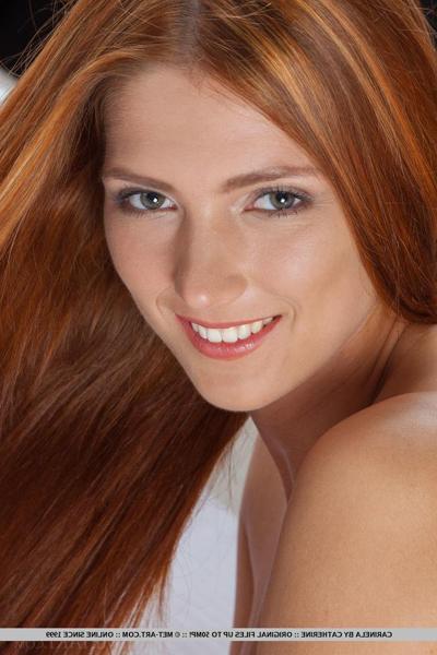 18P Pale redheaded teen Carinela offering closeups of shaved snatch