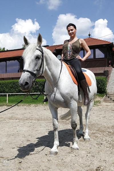16P Pornstar Aletta Ocean is riding a horse outdoor in glasses