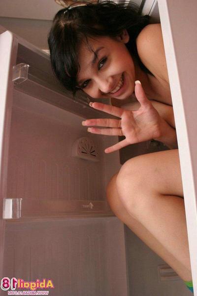 15P Abigail strips out of her panties in the kitchen