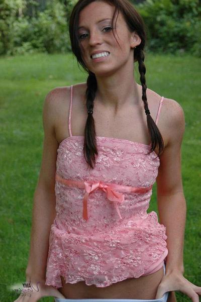 20P Pictures of teen Amy Virgin goofing off in the back yard