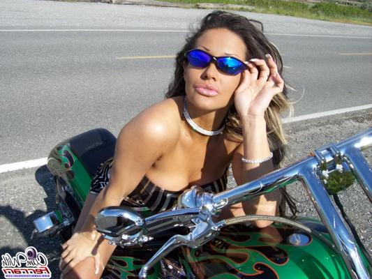 14P Pictures of teen babe Cam With Ferrari teasing on a motorcycle