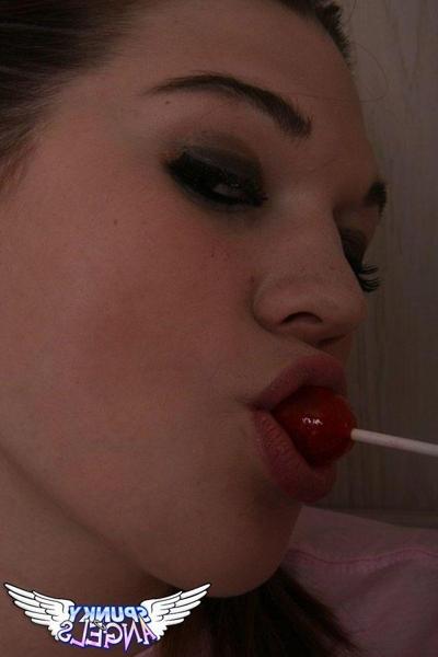 20P Pictures of busty teen Cassandra sucking on something hard