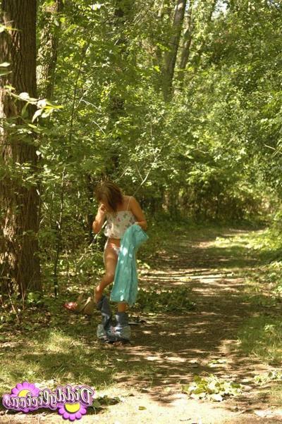 12P Brunette teen Diddy teases in her pink tank top and jeans in the woods