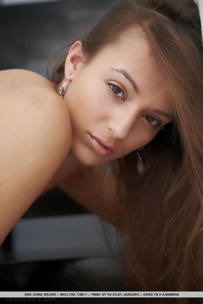 18P Brunette beauty Dominika A strips nude for you on the stairs