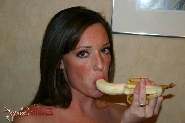20P Pictures of Emily Sweet eating a banana