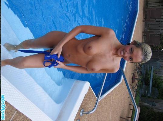20P Pictures of teen Foxy Jacky getting naked in the pool