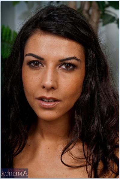16P Sexy brunette MILF in stockings Lou Charmelle stripping in the office