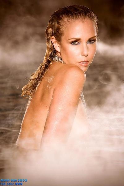 15P Pictures of blonde centerfold Holly Randall getting all wet for you