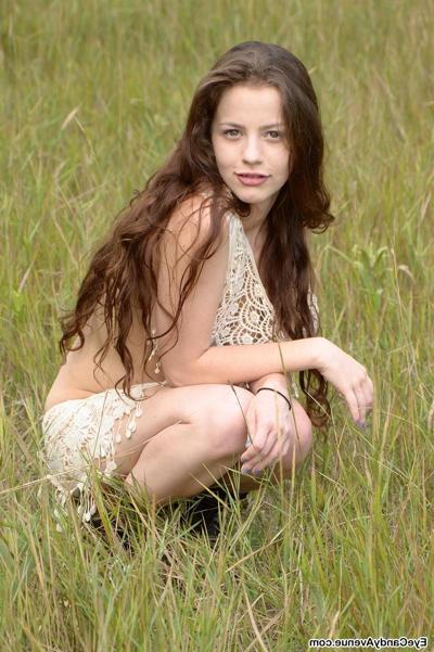 16P Brunette girl Iva strips outside in delicate lace, showing everything