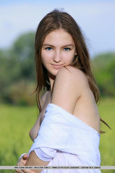 18P Izabel A shows off her nubile body and puffy tits outdoors