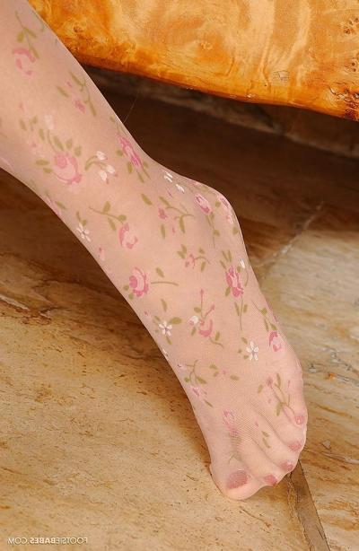 16P Sexy babe Szilvia Lauren exposing her sexy feet covered with stockings
