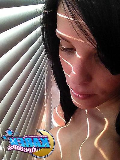 20P Karen Dreams takes pics of her big boobs and round ass by the window