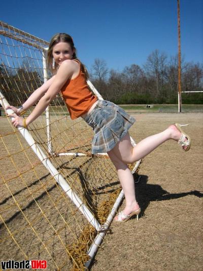 12P Cute petite teen Shelby flashes her perky tits outdoors at the public park