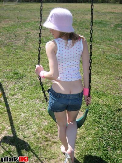 12P Teen girl Shelby teases with her perky perfect tits at the playground