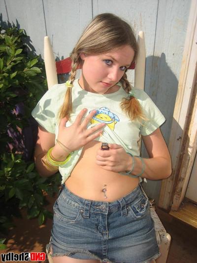 12P Cute teenage babe Shelby takes a smoke break and flashes us her perky tits