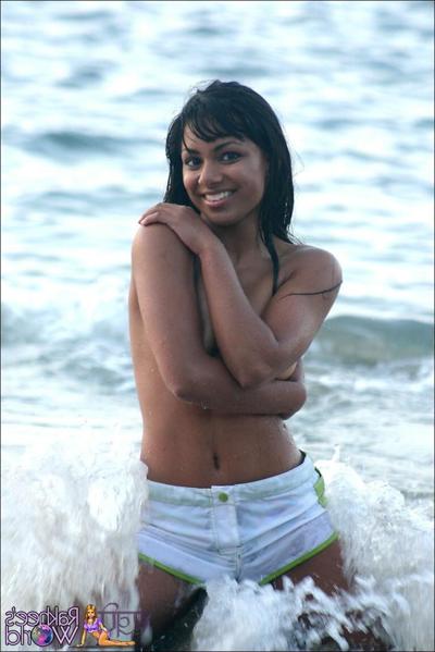 20P Pictures of teen girl Rakhee's World getting all wet for you