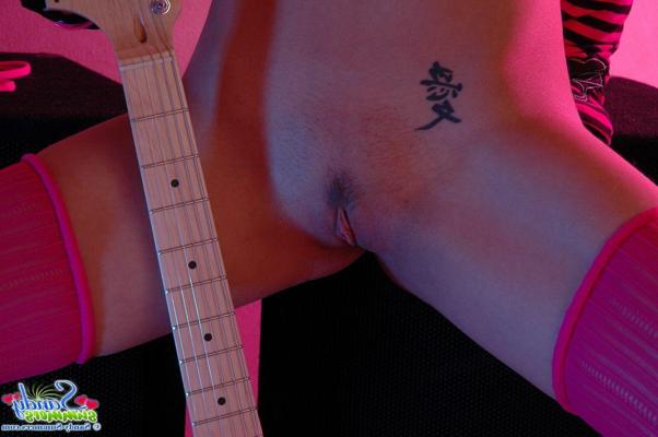 20P Pictures of Sandy Summers playing with something hard