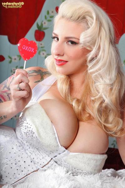 15P Busty blonde hottie September Carrino teases with a lollipop