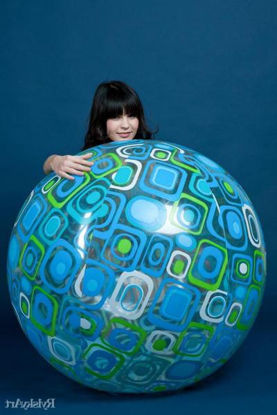 16P Without any trace of makeup, Zelda's natural beauty stands out, baring her nubile body as she playfully poses with a large beach ball.