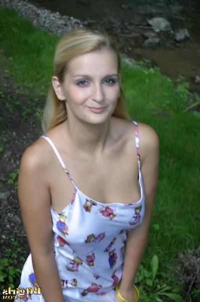 15P Sexy blonde teen removes her white boots and gets her feet all dirty