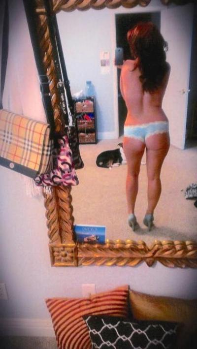 10P Hot big-tittied chick shows off her breasts and curvy body